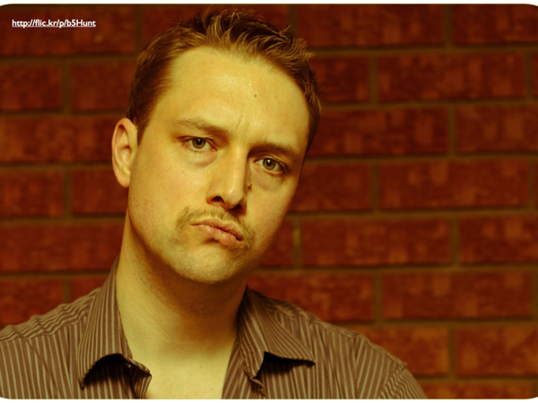 A picture of a man with an ironically bad mustache