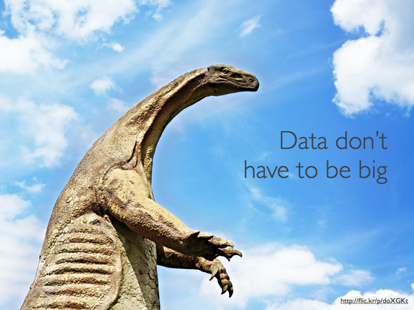 A large dinosaur against a blue sky. Caption reads, 'Data don't have to be big'