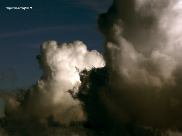 An image of larger fluffy clouds