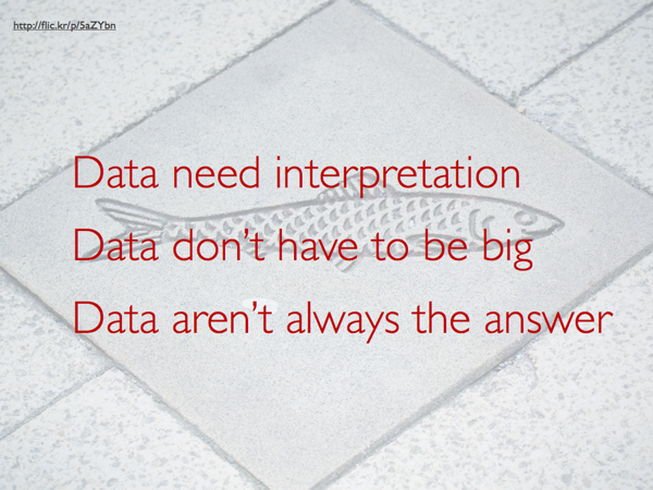 Over a concrete tile with a fish embedded in it, this caption reads, 'Data need interpretation / Data don't have to be big / Data aren't always the answer'
